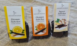 Fruchtstäbchen von Cluizel: Zitronestäbchen, Orangenstäbchen und Ingwer in dunkler Schokolade
