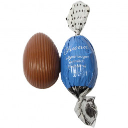 Chocolate Easter egg from milk chocolate filled with cream nougat